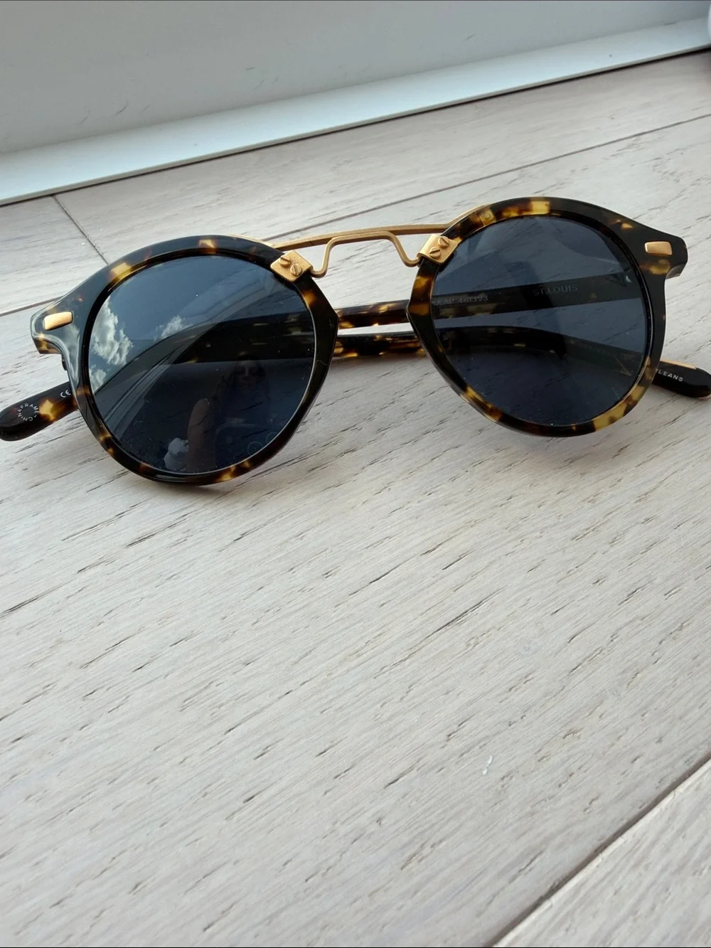 KREWE Tortoiseshell Round Sunglasses with Gold Bridge and Dark Lenses